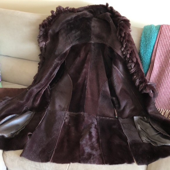 100% Lambs Shearling &rabbit fur trim, purchased @ Nordstrom.Very light but warm - Picture 6 of 13